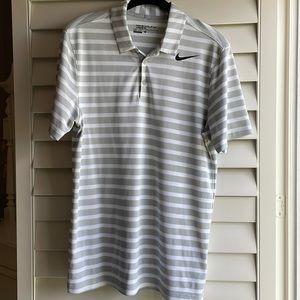 Nike Men’s dri-fit polo in silver and white stripe; standard fit small